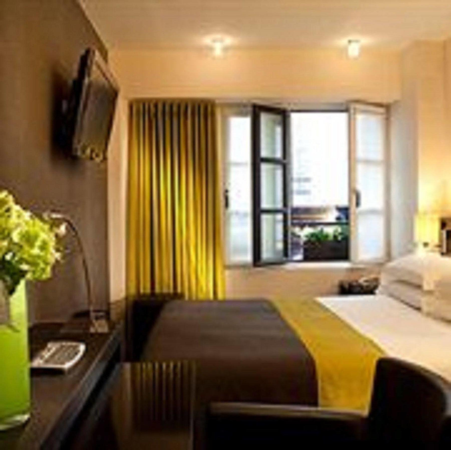 Hotel Caron Le Marais Paris Bagian luar foto